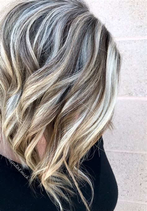 Grey blonde hair is ideal for summer, it makes a statement with tanned skin. Embracing the natural grey | Gray hair growing out, Grey ...