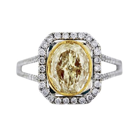 Tremendously popular for its beautiful shade and recent forays into the spotlight of major. 2 Ct Oval Cut Fancy Yellow Diamond Engagement Ring 18K Two ...