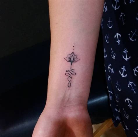 This Small Unalome Lotus Flower Wrist Tattoo Blurmark