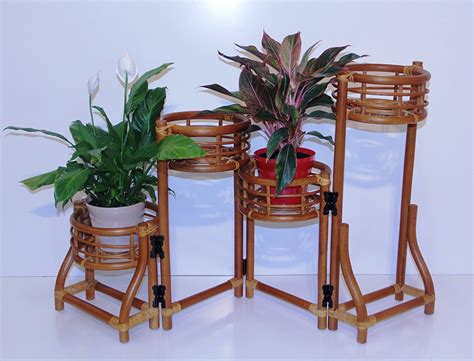 Nice matching set of 2 midcentury rattan and metal trolleys or bar carts. Plant Stand (4 tier) - Rattan USA