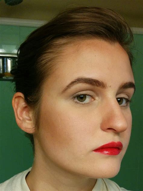 Tried the opposite of what I usually do: power brows, glossy red lips ...
