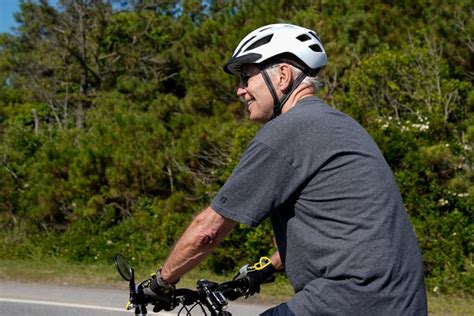 Biden Takes Spill While Getting Off Bike After Beach Ride