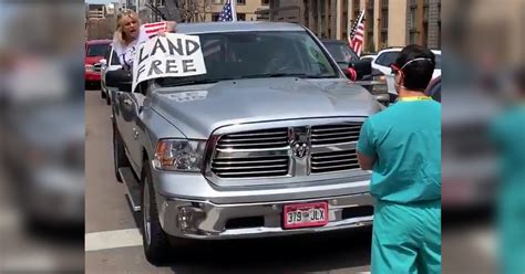 Video Of Nurse Holding Up Anti Lockdown Protestors