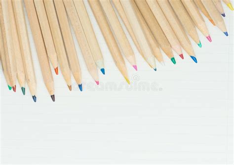 Colored Pencils On White Paper Stock Image Image Of Colorful
