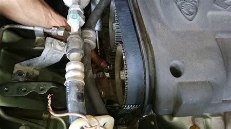 The belt or chain controls the rotations of the camshaft and crankshaft and tells your engine exactly when it's valves should open and close to allow air and gas in and out. how to change the timing belt proton persona Campro Part 2 ...