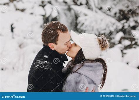Stylish Couple Kissing In Winter Snowy Mountains Happy Romantic Stock