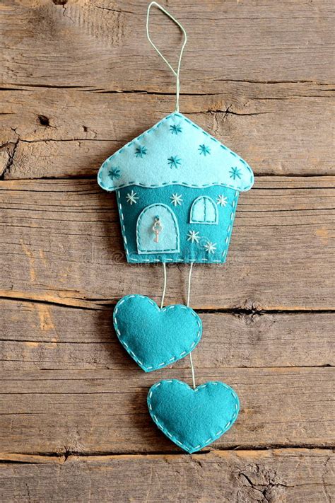 Use our free sewing patterns to whip up easy crafts and gifts. Felt House With Hearts Decor On Old Wooden Background ...