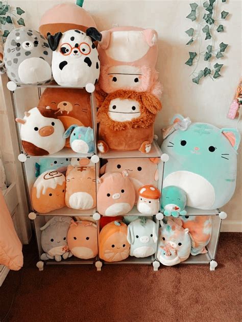 A Shelf Filled With Lots Of Stuffed Animals On Top Of Its Sides In