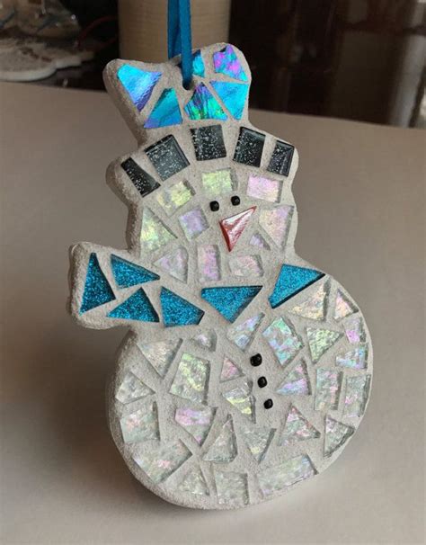 This jolly folk art stained glass santa ornament measures 7.25 inches tall x4.5 inches wide. Stained Glass Mosaic Snowman, Snowman Ornament, Christmas ...