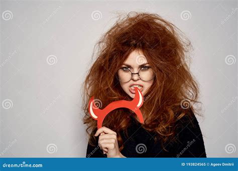 Brunette In A Devil Costume On Halloween Red Horns Glasses Black Dress Stock Image Image Of