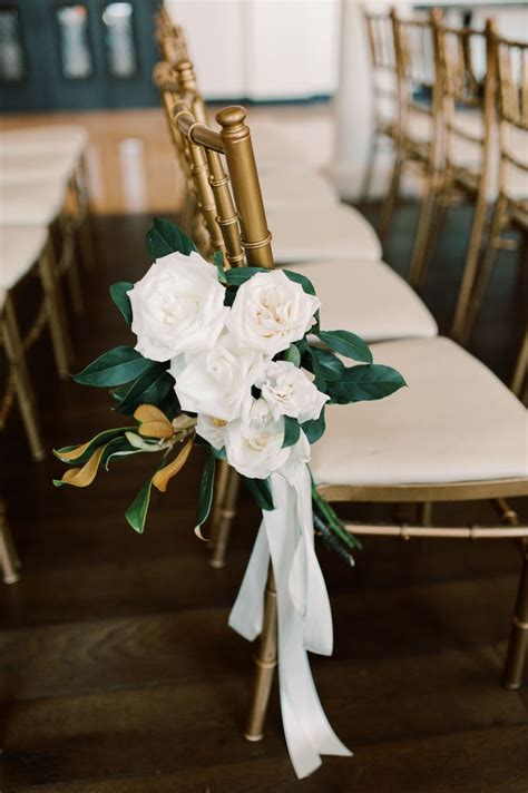 Simple Classic And Elegant Pew Marker Of White Roses And Magnolia