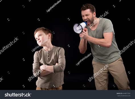 Father Megaphone Screaming Son Standing Crossed Stock Photo 644877334