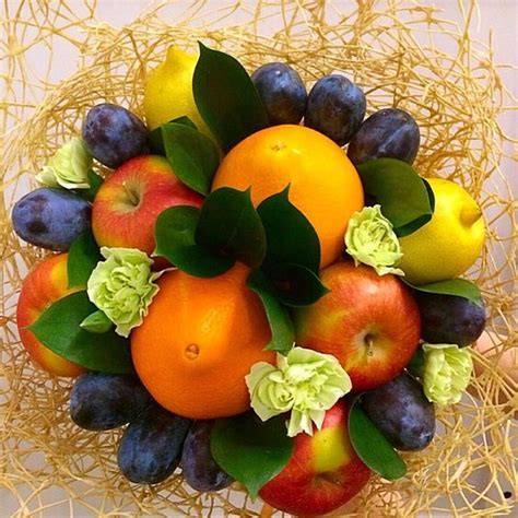 An Arrangement Of Fruit Is Arranged In A Basket