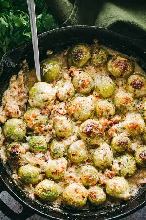 Bump roasted brussels sprouts up to another level of flavor with bacon and garlic cloves. Creamy Cheesy Brussels Sprouts with Bacon Recipe | Easy ...