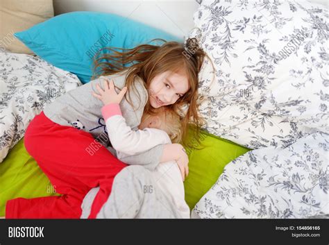 two little sisters image and photo free trial bigstock