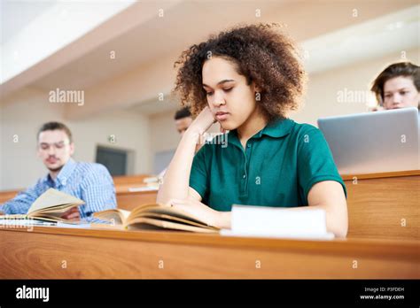Concentrated African American Student Reading Textbook Stock Photo Alamy