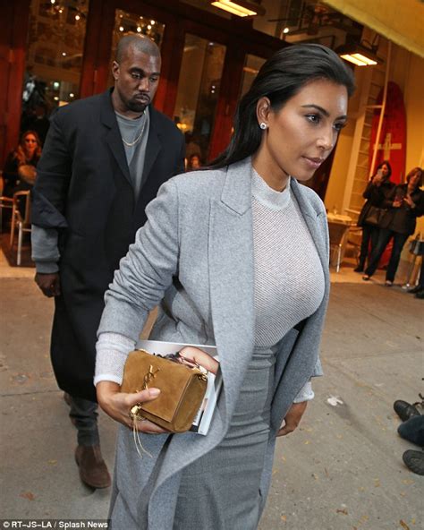 North West Gets Extra Attention From Kim Kardashian As She Grips Pokey