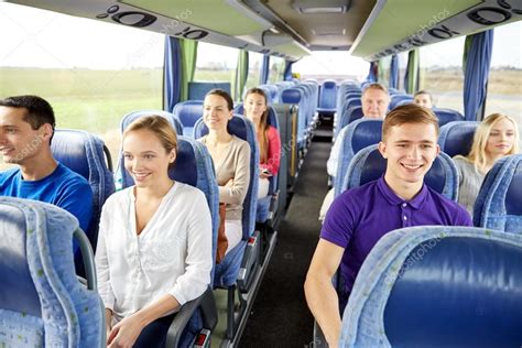 Group Of Happy Passengers In Travel Bus Stock Photo By ©syda