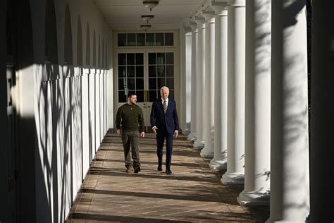 Zelensky Presents Biden With Ukrainian Cross For Military Merit