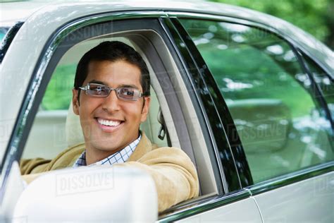 Hispanic Man Driving Car Stock Photo Dissolve