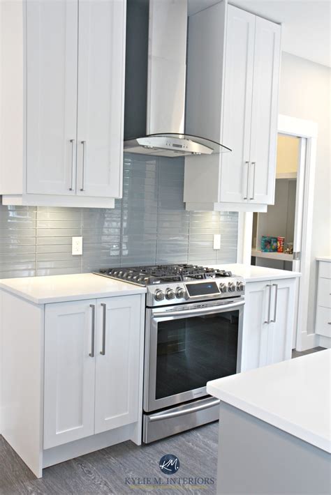 Granite countertop warehouse can bring these granites to you at a fraction of competitor's prices. White shaker style cabinets, white quartz countertops, Coventry Gray island and Stonington Gray ...