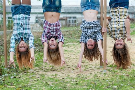 Navegue pelas 655 woman hanging upside down imagens e fotografias de stock disponíveis ou comece uma nova pesquisa para explorar mais imagens e fotografias de stock. Four young girls hanging upside down in park — Stock Photo ...