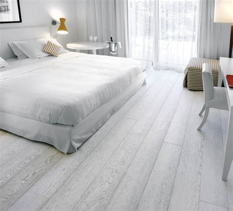 Wood flooring in your master bedroom can add a element of elegance and charm. Image result for greige cabinets with white wash floors ...