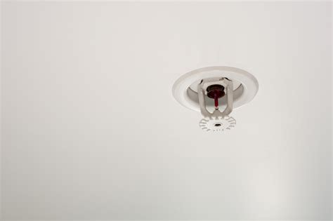 The above shows a sprinkler head fitted using pipe work this is the most desired option and can be used to fit sprinklers in a ceiling void from 150mm and upwards. Ceiling water sprinkler - Security sistems
