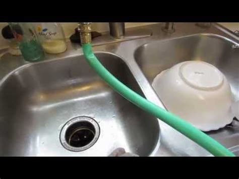 You could fill it in the bathtub, but you still have to haul it out of the tub. How to connect a hose to your sink. | Kitchen faucet, Sink ...