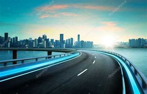 Neon Light Highway Over Cityscape Stock Photo By ©jamesteohart 127678750
