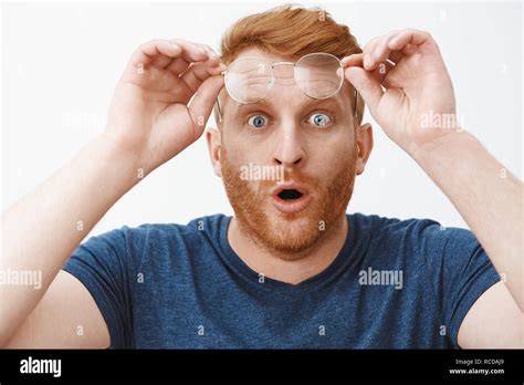 Headshot Of Shocked And Impressed Overwhelmed Redhead Guy With Beard