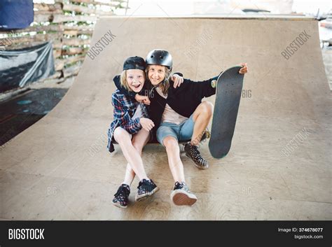 Group Skateboarders Image And Photo Free Trial Bigstock