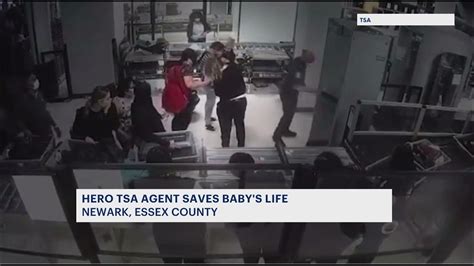 tsa agent saves choking infant at newark liberty international airport youtube