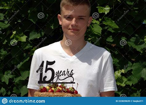 Portrait Of A Teenager With A Cake Who Turned 15 Years Old Stock Image