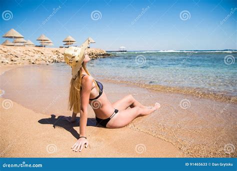 Woman Lying On The Sand The Ocean Coast Summer Vocation Stock Image