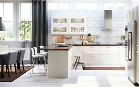 This kitchen storage cabinet with sliding doors is made of durable varnished composite wood. Glass Door Cabinets for your Cooking Area | | Founterior