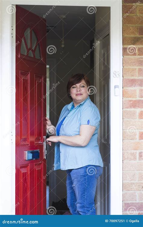 Portrait Of Happy Mature Woman At Front Door Stock Image Image Of Entrance Haired 70097251