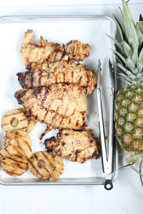 Chicken marinated in whiskey, pineapple juice, bbq sauce, worcestershire, garlic and pepper. Grilled Hawaiian Pineapple Chicken | A Farmgirl's Kitchen