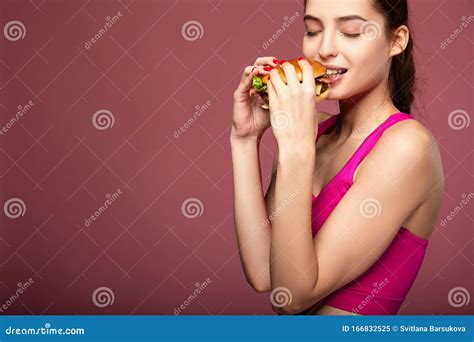 hungry girl eating cheeseburger stock image image of holding junk 166832525