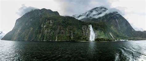 Cloudy And Rainy Day At Milford Sound South Island New Zealand Stock