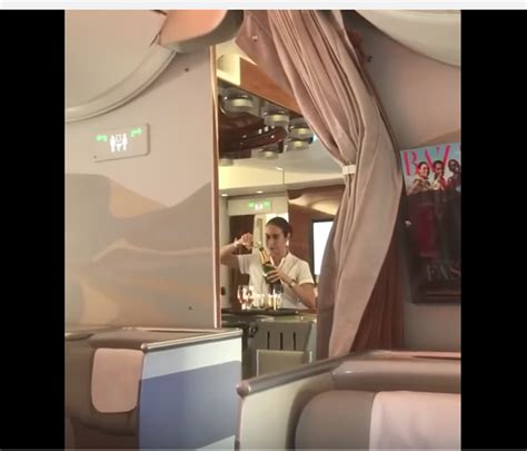 Air Hostess Caught On Camera Pouring Champagne Back Into Bottle