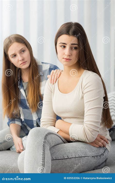 Sad Girl Comforted By Her Friend Stock Photo Image Of House Broken