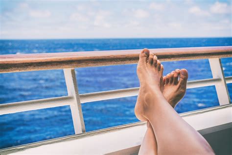 Cruise Vacation Travel Woman Relaxing With Feet On Balcony Ship