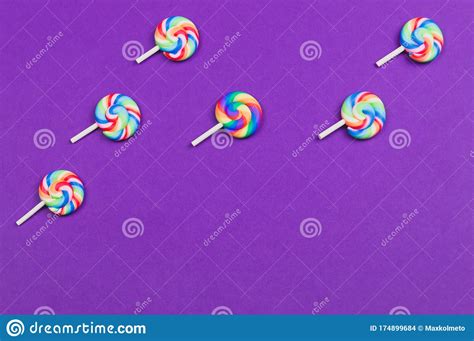 Colorful Candies Lollipops Isolated On Purple Background Festive