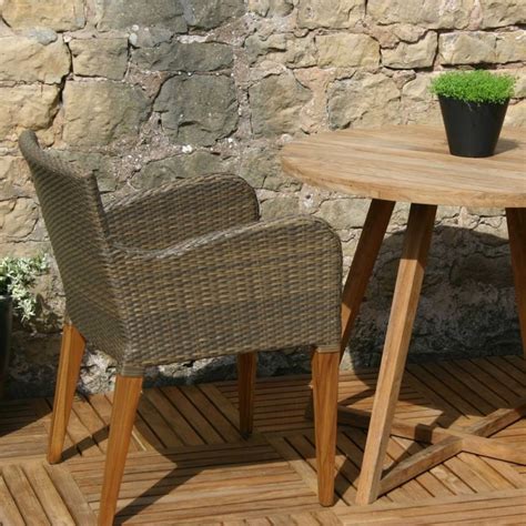 We stock a wide range of luxury teak furniture pieces to suit any outdoor space. Contemporary Summergrass and Teak Rattan Outdoor Dining Chairs UK