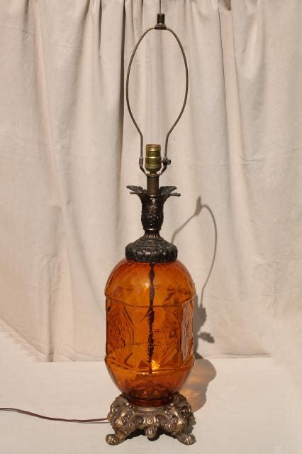 Pair of pierced brass table lamps, one tall (17 1/2 to the top of the light bulb socket, and 26 3/4 to the top of the finial) and one s. 60s vintage amber glass lamp, hippie gypsy style huge retro table lamp
