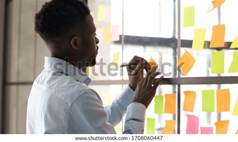 Focused African American Male Employee Write Stock Photo Edit Now