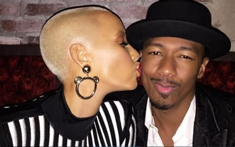 Wow Amber Rose Given Nick Cannon A Hot Peck Photos Naijahoarders