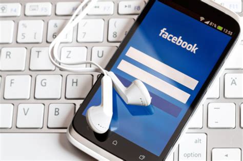 Facebook Application On Smart Phone Screen Stock Photo Download Image