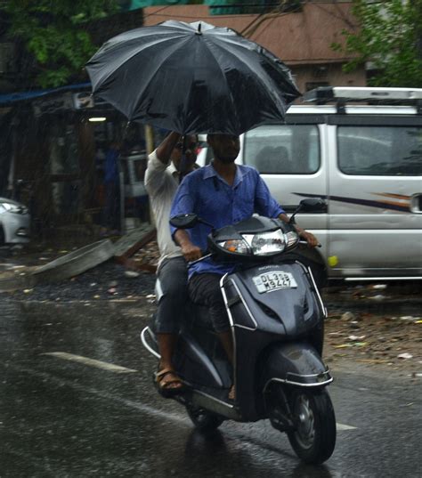 Monsoon Arrives In Delhi Bringing Respite From Sweltering Heat